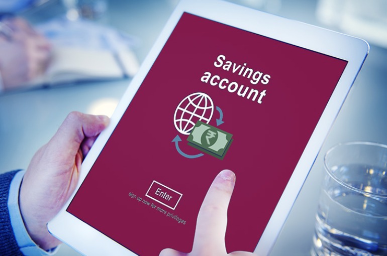 savings accounts typically offer more interest than what type of account?